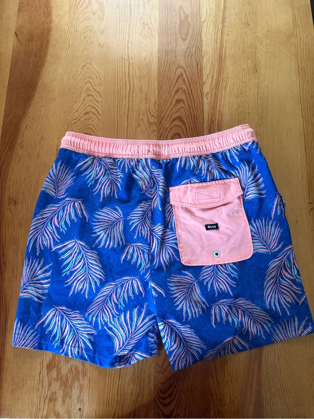 Reef Men's Blue Swim Shorts with Pink Palm Leaf Print